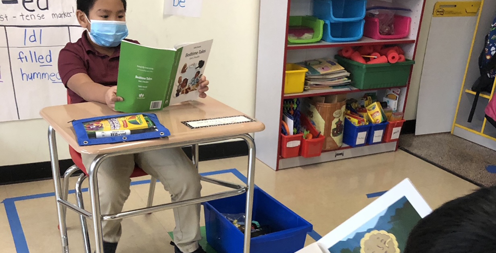 The 2nd grade students at Syracuse Academy of Science and Citizenship school practiced their reading skills by reading aloud to their reading buddy during their CKLA block.