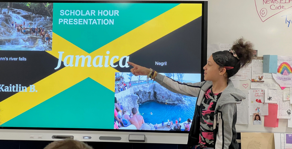 Syracuse Academy of Science and Citizenship elementary school’s 5th-grade students present on a topic that answers three main guiding questions and fun facts about their chosen subject to their classmates and guest audience members.