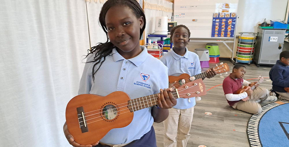 Citizenship & Science Academy of Syracuse Holds First Ukulele Guitar Club Meeting