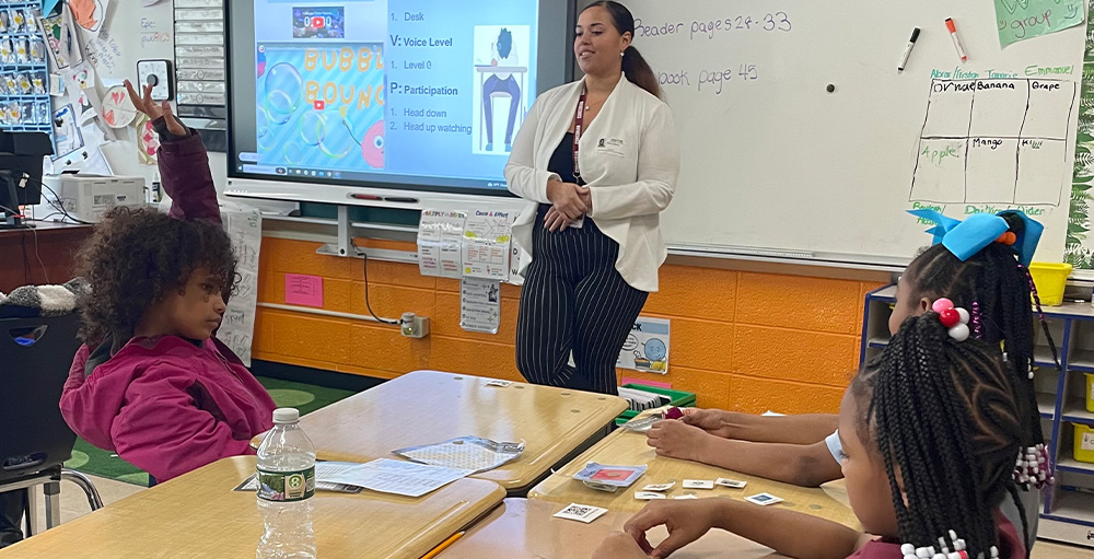 High School Counselor Visits Citizenship & Science Academy of Syracuse Elementary School for 28 Speakers Event